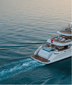 Aerial view of a luxury superyacht cruising on open water